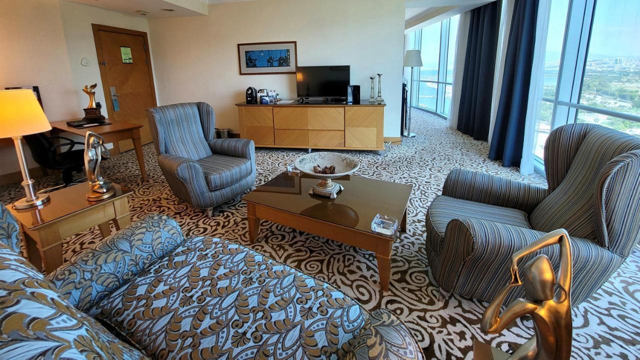 Wyndham Grand Izmir Ozdilek Thermal & Spa Exterior photo A living room in a suite at the Marina Bay Sands